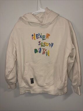Zara Cream Hoodie with Bright Multicolor 'Never Slow Down' Graphic